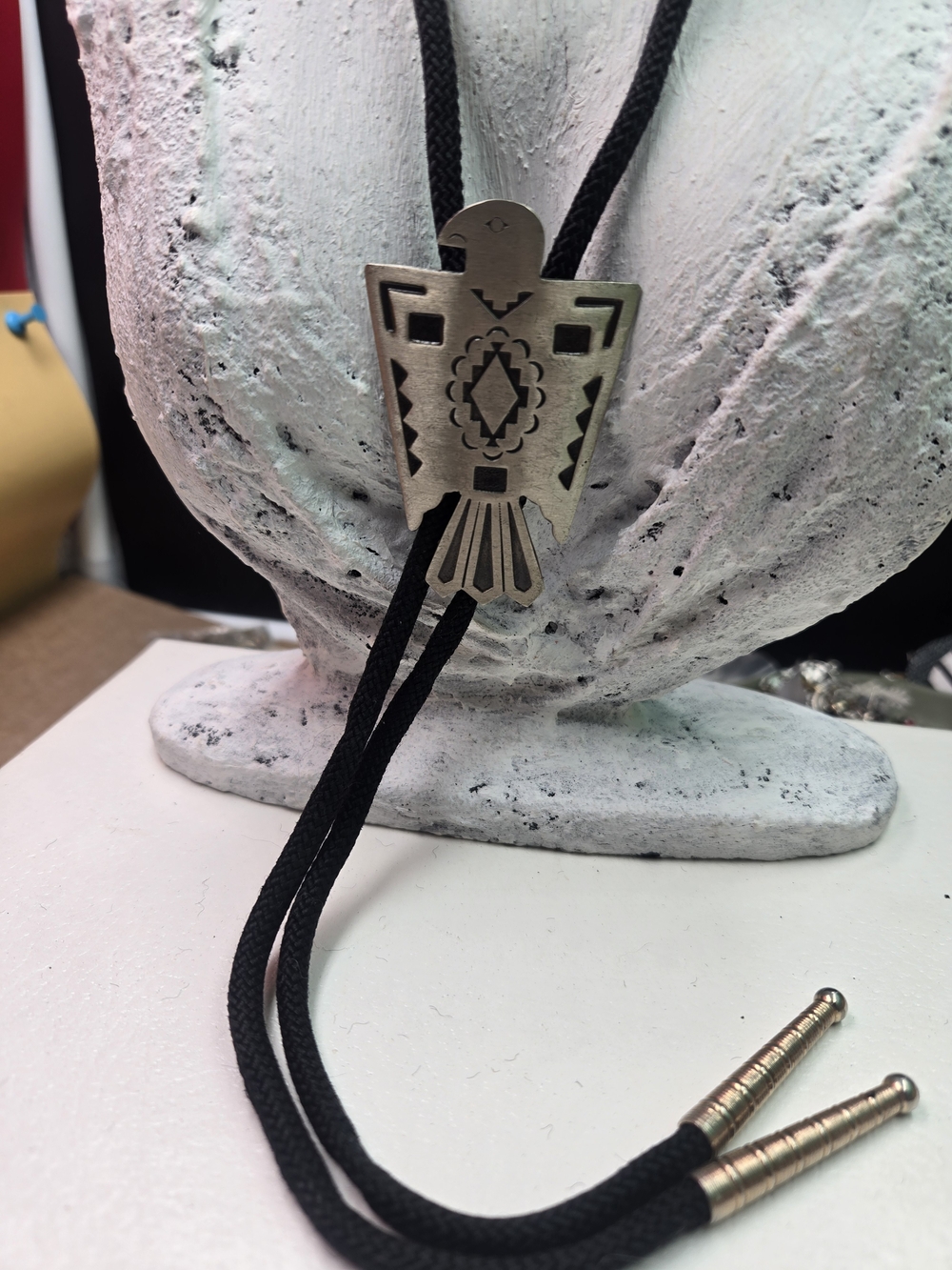 Engraved Thunderbird Bolo Tie with Black Cord